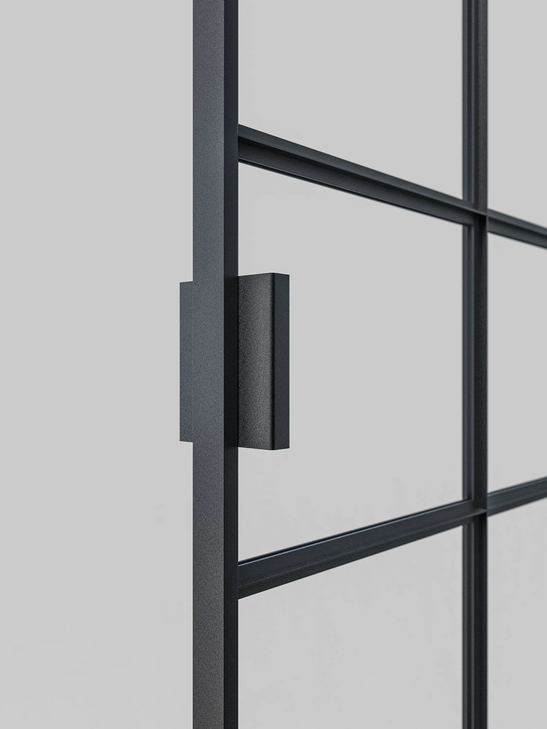 Schwarzer Winkelgriff aus Aluminium mit U-Profil, 15 cm Länge, an einer Lofttür.